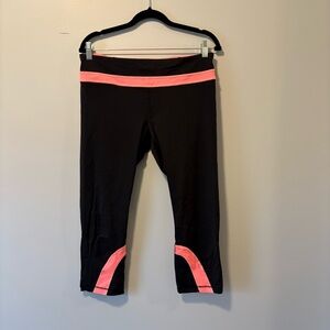 Lululemon Size 10 Black Capri Leggings with Pink Accent Waistband